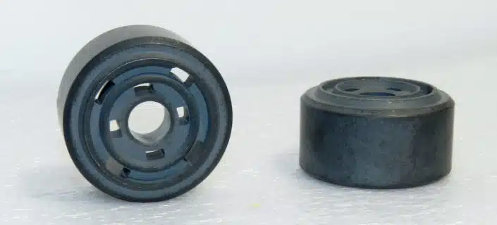 Sintered components of shock absorbers